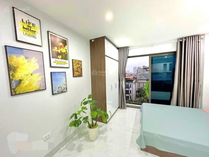 Bán tòa nhà phố An Dương Vương Tây Hồ 23 tỷ DT 120m2 MT 7.5m 8 tầng thang máy 32p khép kín full nội