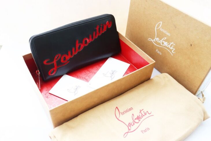 Bóp cầm tay Nữ Louboutin Da đen chữ đỏ đặc trưng ( Thương hiệu Pháp ) Like New Fullbox