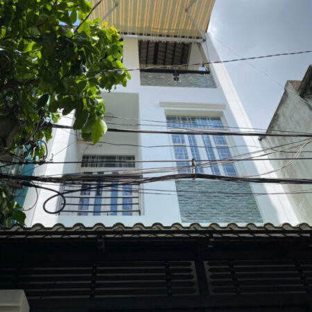 Nhà hẻm ô tô Quận 11, đối diện Đầm Sen. Diện tích 168m², thu nhập cho thuê 25 triệu/tháng. Sổ hồng