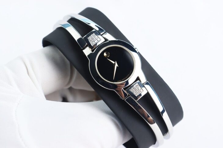 Đồng Hồ Movado Nữ ( kiểu Lắc Tay ) Niềng đính Kim Cương thiên nhiên – Fullbox