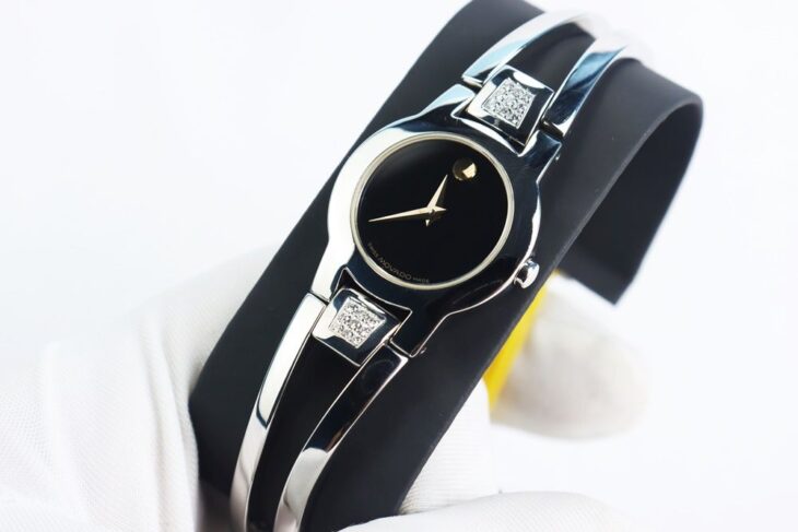 Đồng Hồ Movado Nữ ( kiểu Lắc Tay ) Niềng đính Kim Cương thiên nhiên – Fullbox