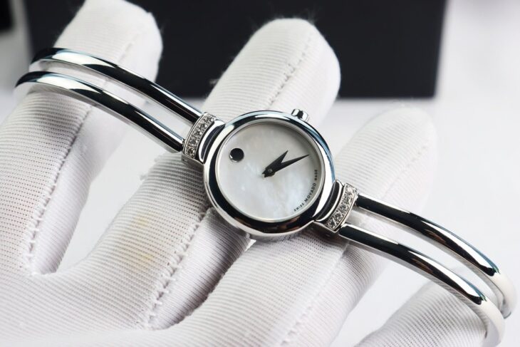 Đồng Hồ Nữ : Movado Lắc Tay, mặt xà cừ, đính 10 viên Kim Cương thiên nhiên fullbox…