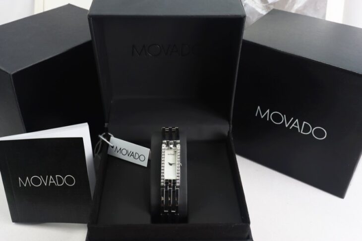 ĐH Nữ MOVADO Lắc tay, mặt Xà Cừ, đính 28 viên Kim Cương thiên nhiên ( Viên Lớn ) Fullbox
