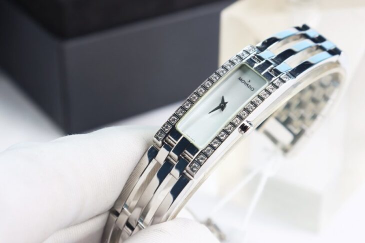 ĐH Nữ MOVADO Lắc tay, mặt Xà Cừ, đính 28 viên Kim Cương thiên nhiên ( Viên Lớn ) Fullbox
