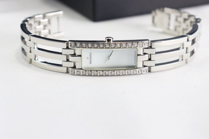 ĐH Nữ MOVADO Lắc tay, mặt Xà Cừ, đính 28 viên Kim Cương thiên nhiên ( Viên Lớn ) Fullbox