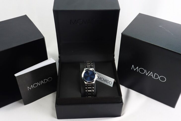 Đồng Hồ Nữ : Movado mặt xanh Naxy dây thép – Size 28mm Fullbox…